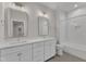 Bright bathroom features double vanity with a tub with a shower at 3803 Bennett Grove Dr, Wake Forest, NC 27587