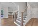 Inviting foyer with staircase and views into the open living spaces at 3803 Bennett Grove Dr, Wake Forest, NC 27587