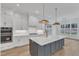 Spacious kitchen with island, stainless appliances, and ample counter space at 3803 Bennett Grove Dr, Wake Forest, NC 27587