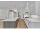 Kitchen with island, stainless appliances, and open floor plan at 3803 Bennett Grove Dr, Wake Forest, NC 27587