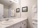 Clean bathroom with white vanity and marble countertop at 431 Oak Run Dr, Raleigh, NC 27606
