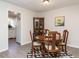 Dining room features hardwood floors, a round table, and kitchen access at 431 Oak Run Dr, Raleigh, NC 27606
