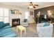 Living room features a fireplace, comfortable seating, and a neutral color scheme at 431 Oak Run Dr, Raleigh, NC 27606