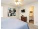 Main bedroom with ensuite bathroom and large artwork at 431 Oak Run Dr, Raleigh, NC 27606