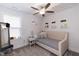 Bright bedroom featuring a daybed and plenty of natural light at 438 S Hillsborough St, Franklinton, NC 27525