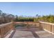 Wooden deck overlooking a pond and wooded area at 445 Brier Summit Pl, Durham, NC 27703