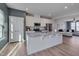Open concept kitchen with island and stainless steel appliances at 445 Brier Summit Pl, Durham, NC 27703
