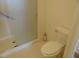 Full bathroom with toilet and shower at 4712 Fox Fern Ln, Raleigh, NC 27604