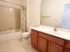 Bathroom featuring a single vanity, tub and shower at 4712 Fox Fern Ln, Raleigh, NC 27604