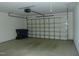 Attached garage with overhead door and ample storage space at 4712 Fox Fern Ln, Raleigh, NC 27604
