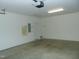 Attached garage with overhead door and ample storage space at 4712 Fox Fern Ln, Raleigh, NC 27604