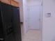 Small laundry room with hookups and a door to the outside at 4712 Fox Fern Ln, Raleigh, NC 27604