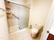 Walk-in shower featuring tile surround and a glass enclosure at 4712 Fox Fern Ln, Raleigh, NC 27604