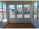 Sunroom with ample natural light and view of the neighborhood at 4712 Fox Fern Ln, Raleigh, NC 27604