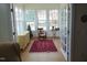 Sunroom with ample natural light and comfortable seating at 4712 Fox Fern Ln, Raleigh, NC 27604