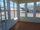 Sunroom with multiple windows and access to exterior at 4712 Fox Fern Ln, Raleigh, NC 27604