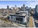 Stylish city condo with modern architecture and private balconies boasting stunning downtown skyline views at 523 S West # 305, Raleigh, NC 27601