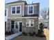 Charming townhome with stone facade, dual siding and meticulous front yard landscaping at 6328 Granite Quarry Dr, Raleigh, NC 27610