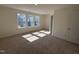 Sunlit bedroom with plush carpeting and ample natural light at 6330 Granite Quarry Dr, Raleigh, NC 27610