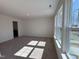 Bright bedroom with carpet and natural light from large windows at 6330 Granite Quarry Dr, Raleigh, NC 27610
