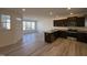 Open kitchen featuring granite countertops and stainless steel appliances at 6330 Granite Quarry Dr, Raleigh, NC 27610