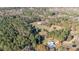 Aerial view showing house, additional dwelling, and large lot at 754 Firestone Ln, Sanford, NC 27330