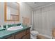 Clean bathroom with tub shower and green vanity at 754 Firestone Ln, Sanford, NC 27330