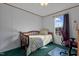 Bedroom with a twin bed and an office chair at 754 Firestone Ln, Sanford, NC 27330