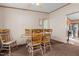 Cozy dining area with a wooden table and four chairs at 754 Firestone Ln, Sanford, NC 27330