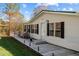 Front view of the house with deck and landscaping at 754 Firestone Ln, Sanford, NC 27330