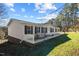 White single story home with deck and fence at 754 Firestone Ln, Sanford, NC 27330