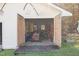 Open garage doors reveal storage and workshop space at 754 Firestone Ln, Sanford, NC 27330