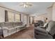Bright and airy living room with two sofas and a ceiling fan at 754 Firestone Ln, Sanford, NC 27330