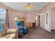 Spacious living room with fireplace and lots of natural light at 754 Firestone Ln, Sanford, NC 27330