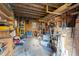 A cluttered storage area with shelves and tools at 754 Firestone Ln, Sanford, NC 27330