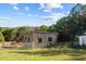 Detached workshop with metal siding and ample storage space at 754 Firestone Ln, Sanford, NC 27330