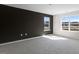 Spacious bedroom featuring neutral carpet, and two large windows at 845 Old Tarboro Rd, Wendell, NC 27591
