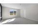 Cozy bedroom featuring neutral carpet, and a large window with backyard view at 845 Old Tarboro Rd, Wendell, NC 27591