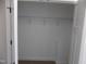 Walk-in closet with single shelf and hanging bar for your storage needs at 104 Halifax Rd, Louisburg, NC 27549