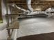 This encapsulated basement includes shelving for plenty of additional storage space at 1119 Sagamore Dr, Louisburg, NC 27549