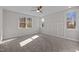 Serene bedroom with natural light and carpeted floors at 1119 Sagamore Dr, Louisburg, NC 27549
