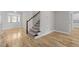 Bright foyer with hardwood floors and a staircase leading to the upper level at 1119 Sagamore Dr, Louisburg, NC 27549