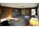 Cozy living room with brick wall, tile floor, zebra rug, and comfortable seating area at 1302 E Jones St, Raleigh, NC 27610