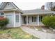 Inviting front porch featuring a walkway and manicured landscaping, offering a warm welcome at 1508 Woods Creek Dr, Garner, NC 27529