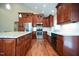 Well-equipped kitchen with stainless appliances, granite countertops, and ample cabinet space at 1508 Woods Creek Dr, Garner, NC 27529