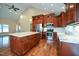 Well-equipped kitchen with stainless appliances, granite countertops, and a spacious island at 1508 Woods Creek Dr, Garner, NC 27529