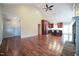 Open-concept layout showcasing hardwood floors, a kitchen with a bar, and a cozy living space at 1508 Woods Creek Dr, Garner, NC 27529