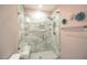 Glass shower with a tile surround at 1508 Woods Creek Dr, Garner, NC 27529