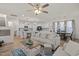 Open concept kitchen and living area with island and stainless steel appliances at 168 Begonia St, Angier, NC 27501