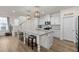 Open concept kitchen with large island and stainless appliances at 168 Begonia St, Angier, NC 27501